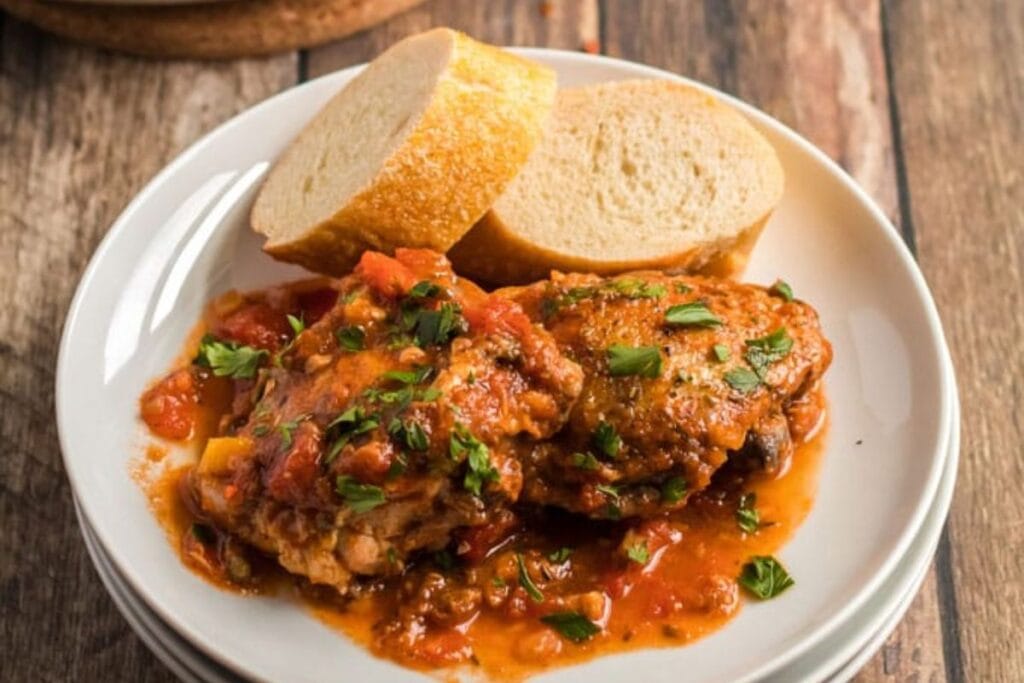A close up shot of chicken cacciatore.