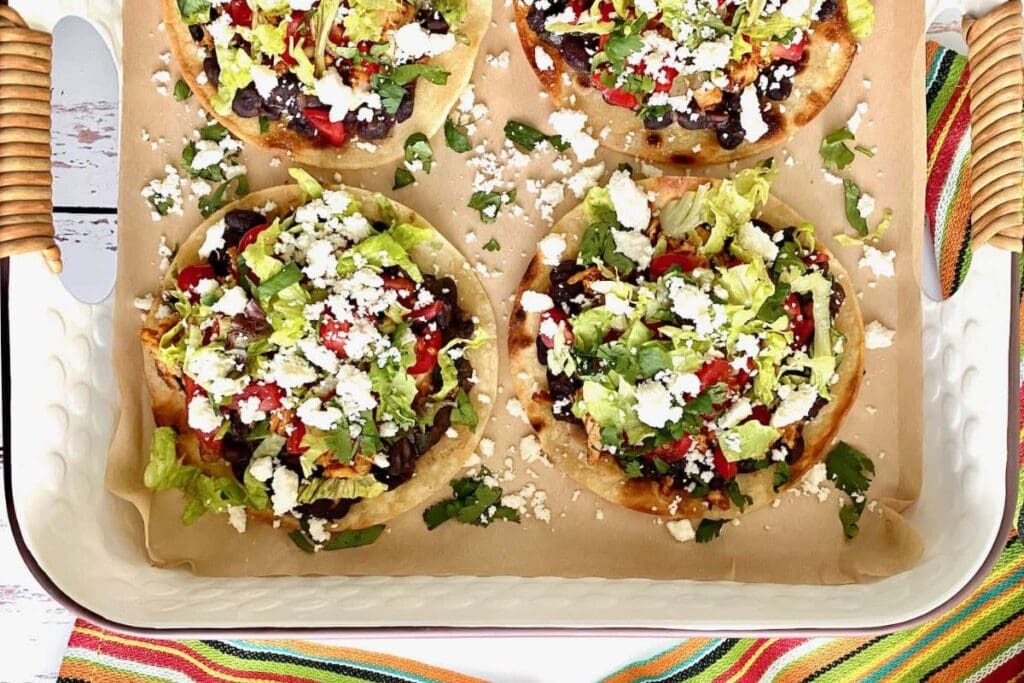 Chicken tostadas on a tray.