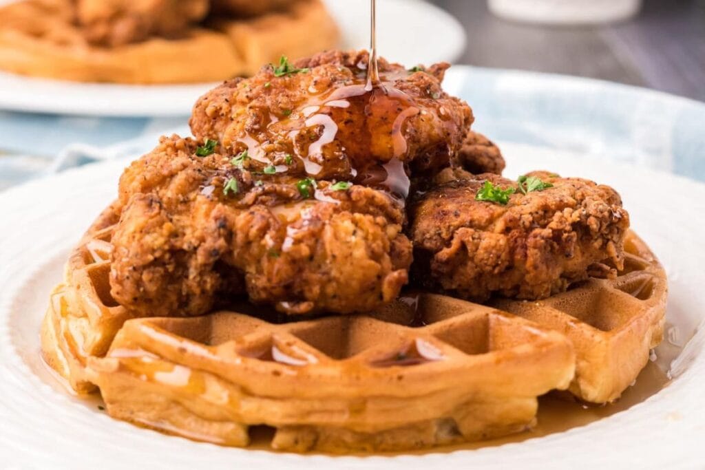 A close up shot of chicken and waffles.