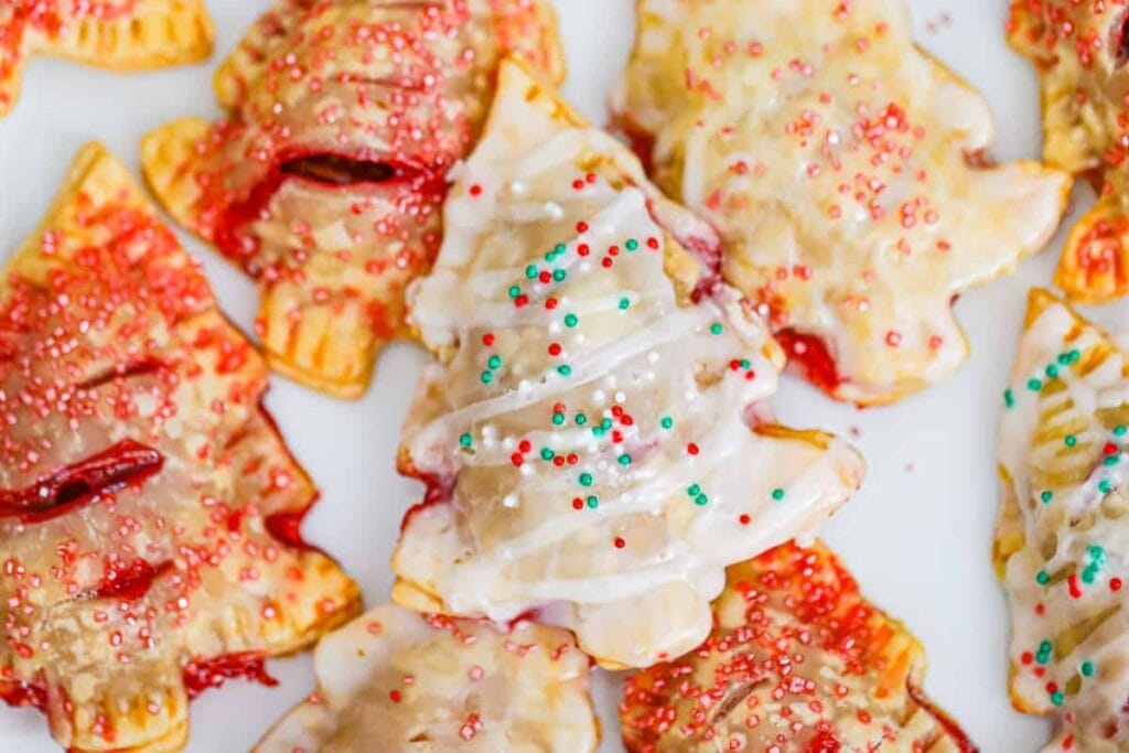 A close up shot of Christmas tree strawberry hand pies.