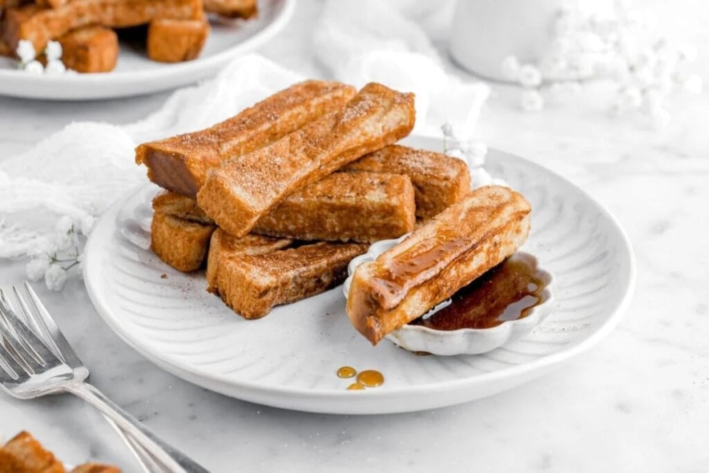 French toast sticks on a plate.