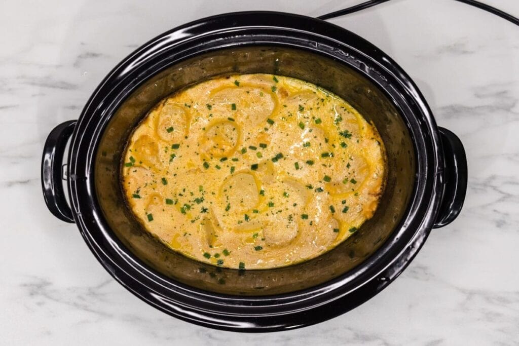 Scalloped potatoes in a crockpot.