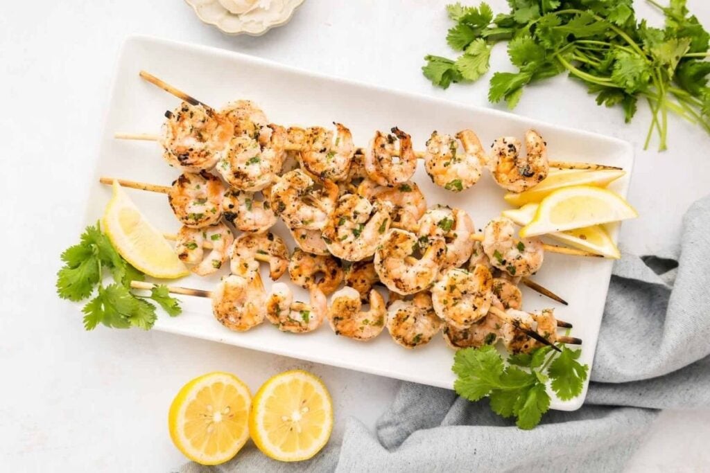 Shrimp skewers on a plate.