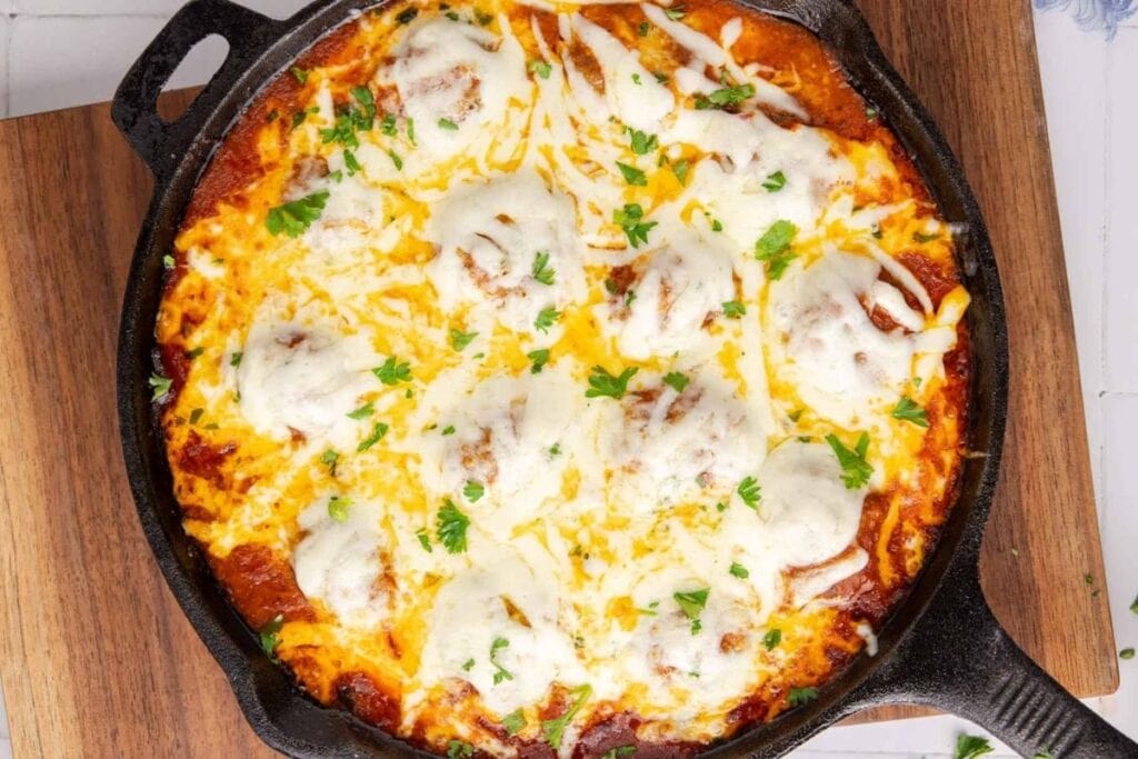 Meatball parmigiana close up shot.