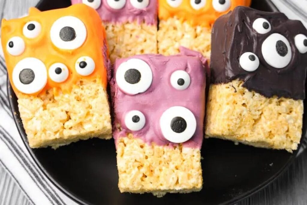 Monster rice krispies on a plate.