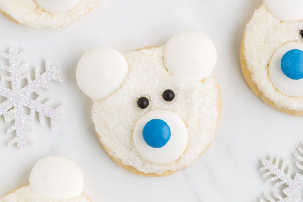 A close up shot of polar bear face cookies.