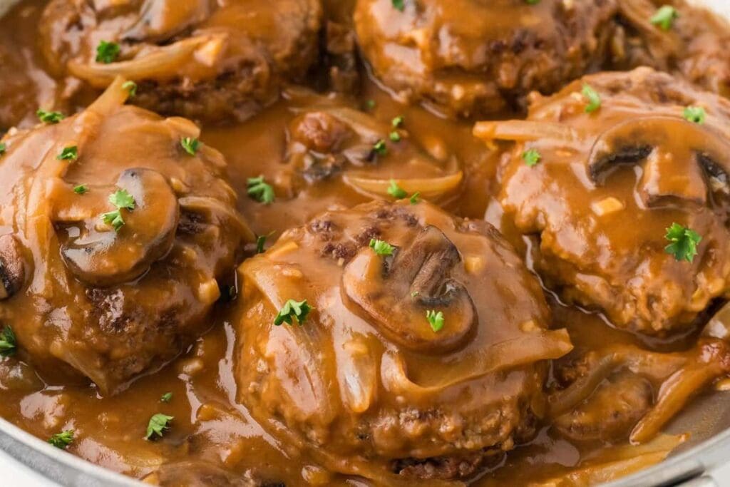 A close up shot of salisbury steak.