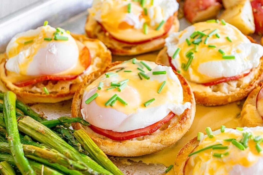 A close up shot of sheet pan eggs benedict.