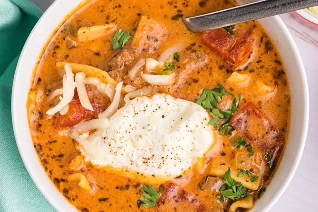 A close up shot of lasagna soup.