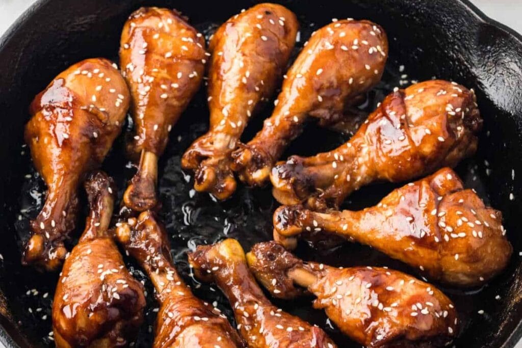 A close up shot of sticky chicken.
