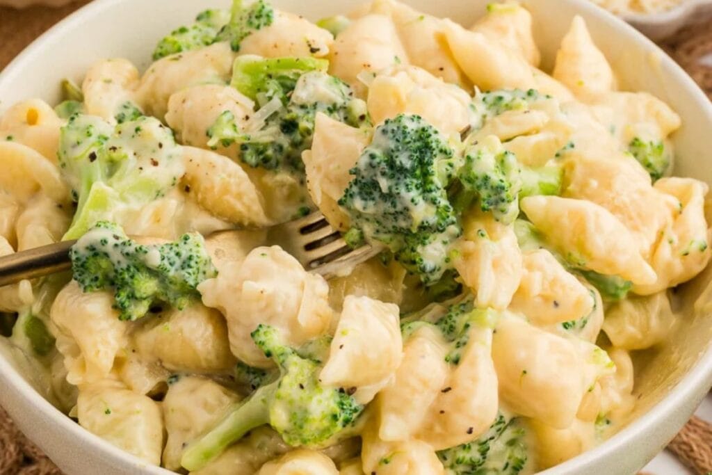 A close up shot of broccoli mac and cheese.