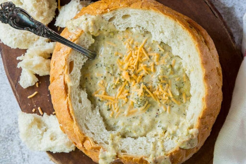 Broccoli cheese soup served in a bread bowl.