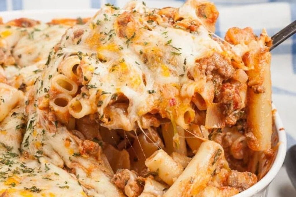 Close-up of Cheesy Baked Ziti, showing melted cheese and pasta..