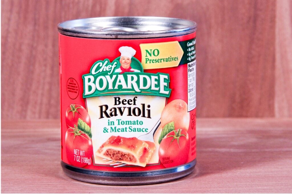 Can of Chef Boyardee Beef Ravioli in tomato and meat sauce.