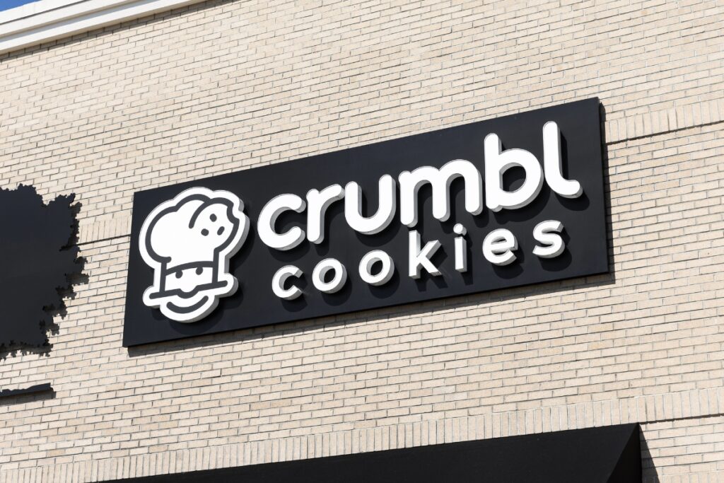 Cookie shop logo displayed on the exterior wall of a building.