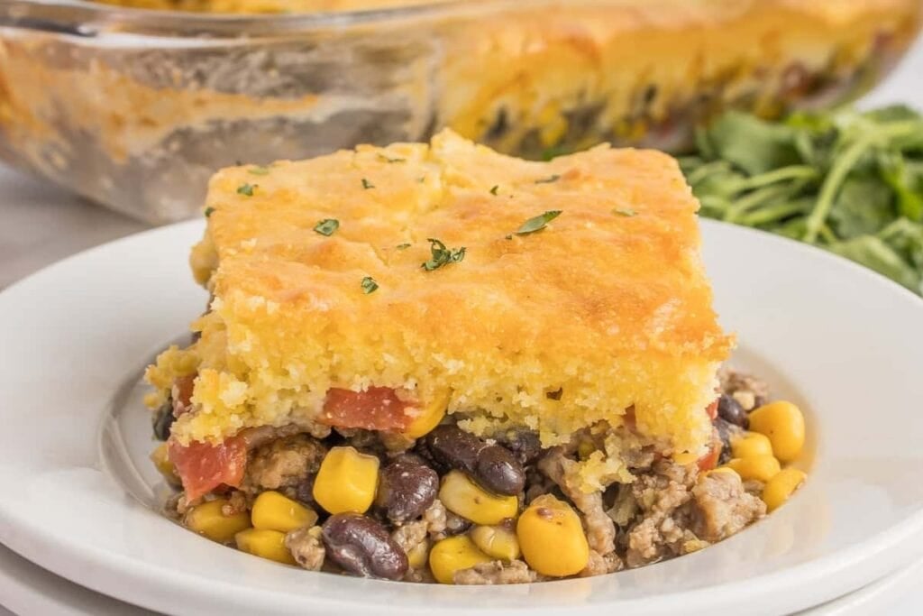 Cowboy cornbread casserole served on a plate.