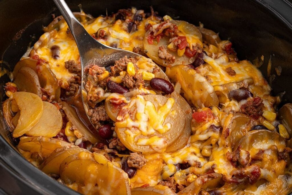 Crockpot cheese and potato casserole in slow cooker.