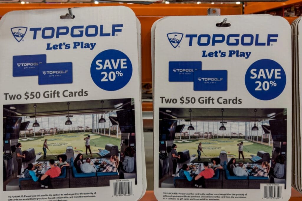 Gift cards displayed on a store rack.