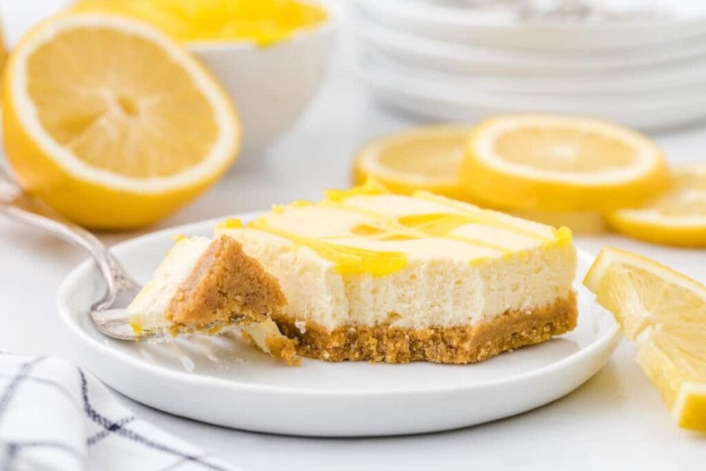 Lemon cheesecake bar on a plate.