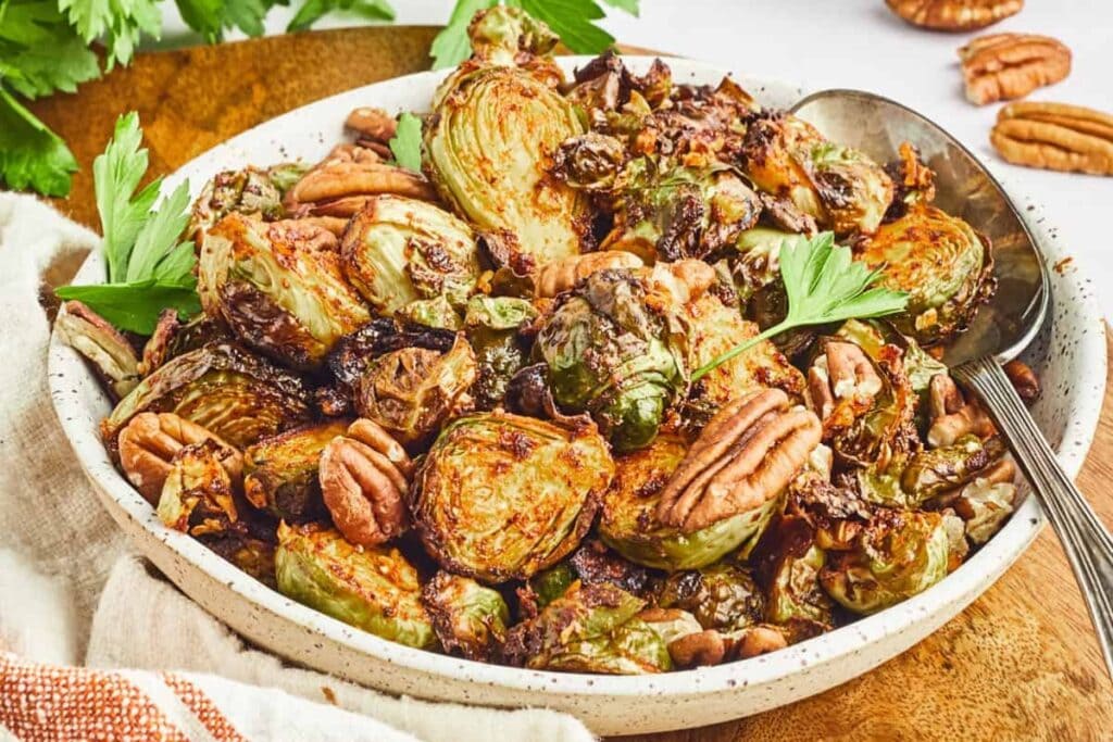 Maple dijon brussels sprouts on a plate.