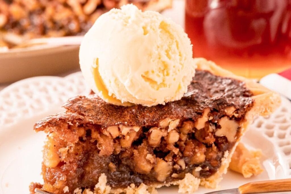 Maple walnut pie on a plate.