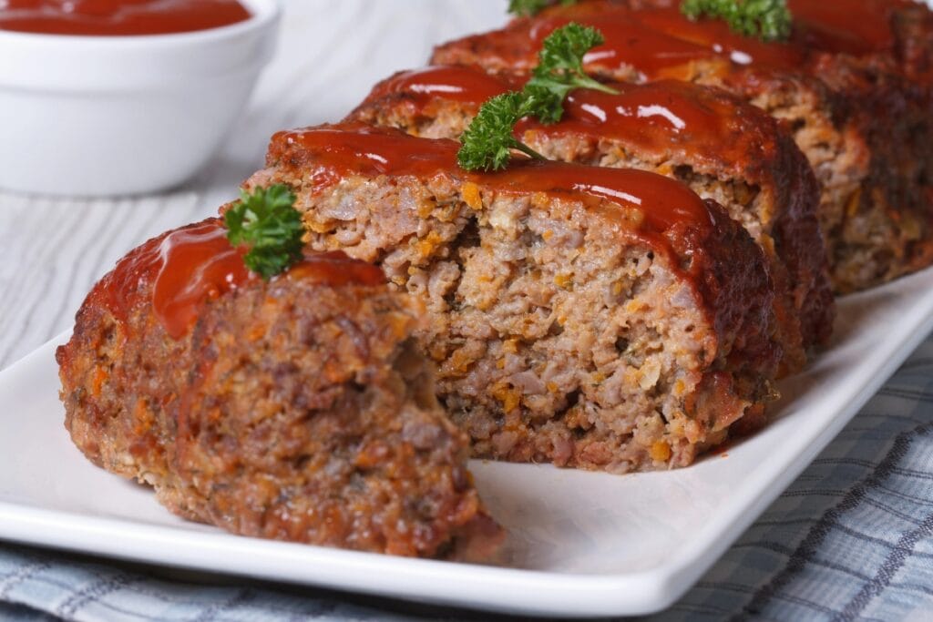 Slices of meatloaf on a plate.