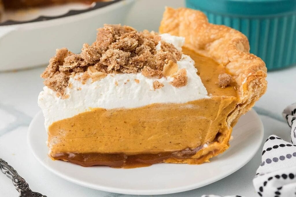 Slice of Milk Bar pumpkin pie served on a plate.