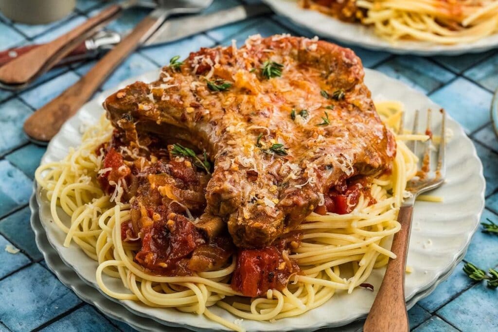 Pork chops Italiano on a plate.