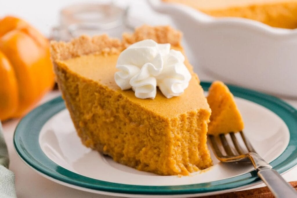 Pumpkin chiffon pie on a plate.