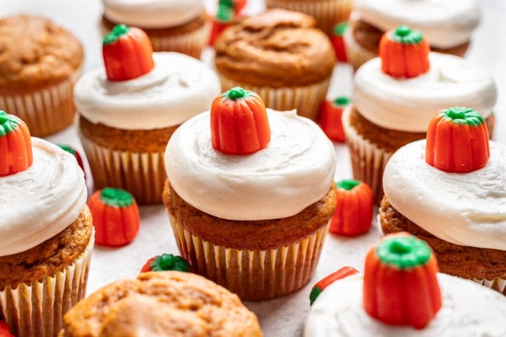 Pumpkin cupcakes on a plate.