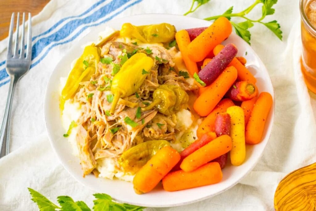 Slow-cooked Mississippi pork served on a plate.