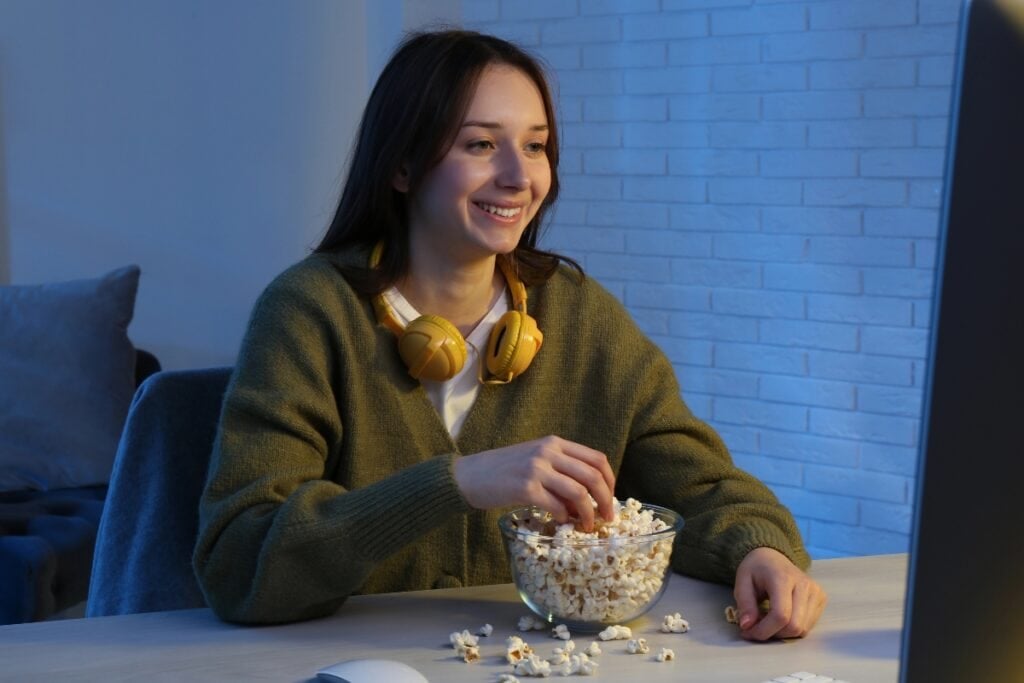 Watching a movie at home.