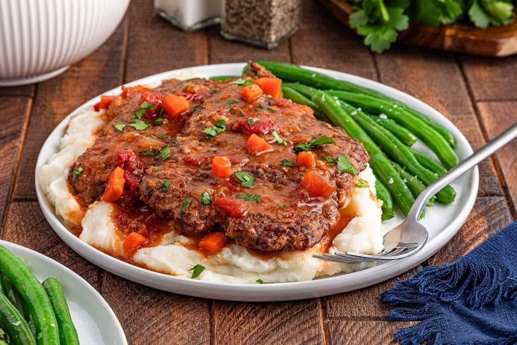 Swiss steak on a plate.