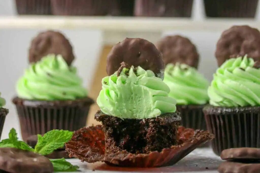 Chocolate Thin Mint cupcakes on a table.