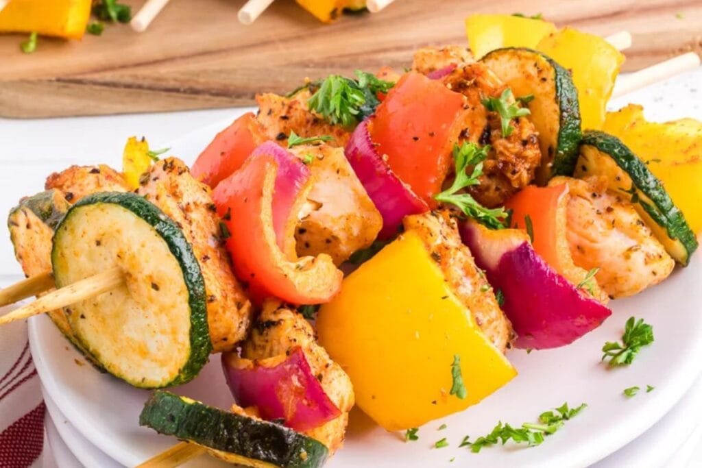 A close up shot of chicken kabobs.