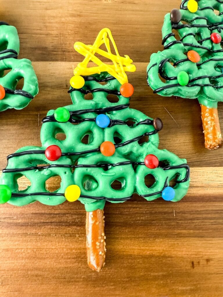 A close up shot of Christmas tree pretzels.