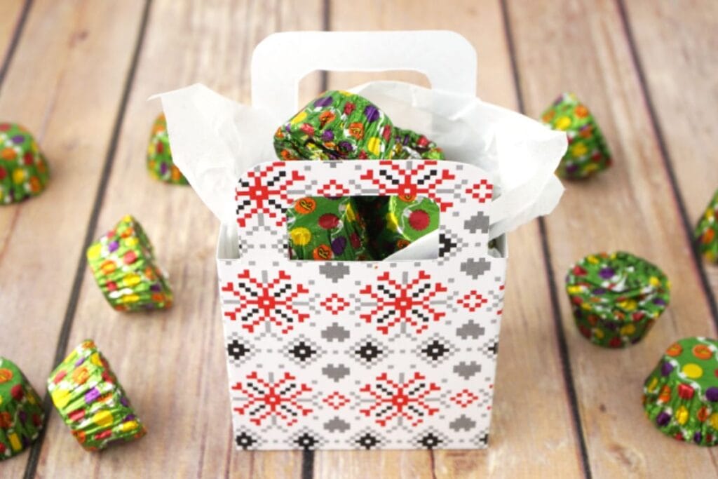 A close up shot of sweater gift boxes.