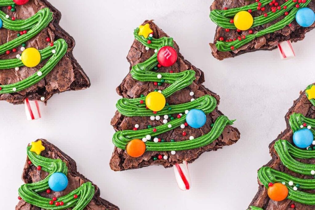 A close up shot of Christmas tree brownies.