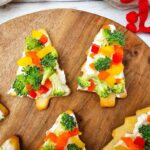 A close up shot of Christmas tree pizzas.