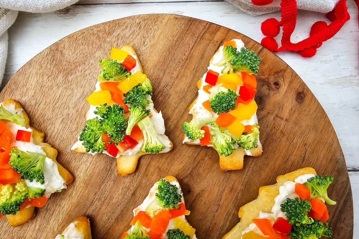 A close up shot of Christmas tree pizzas.