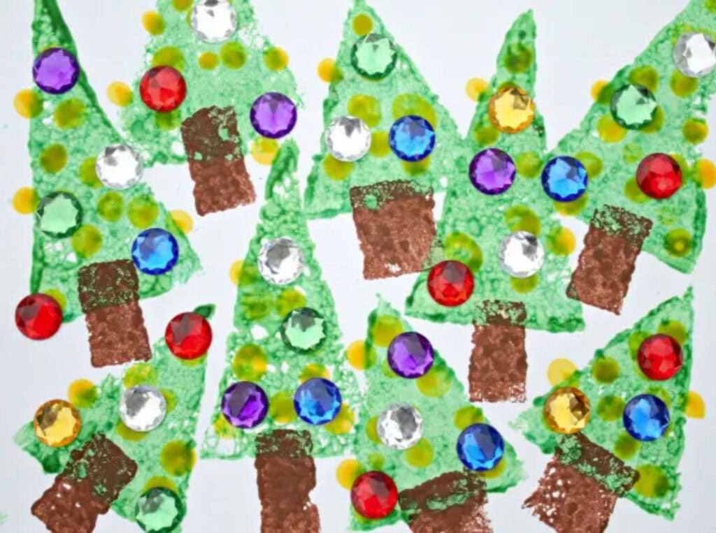 A close up shot of Christmas tree sponge painting.