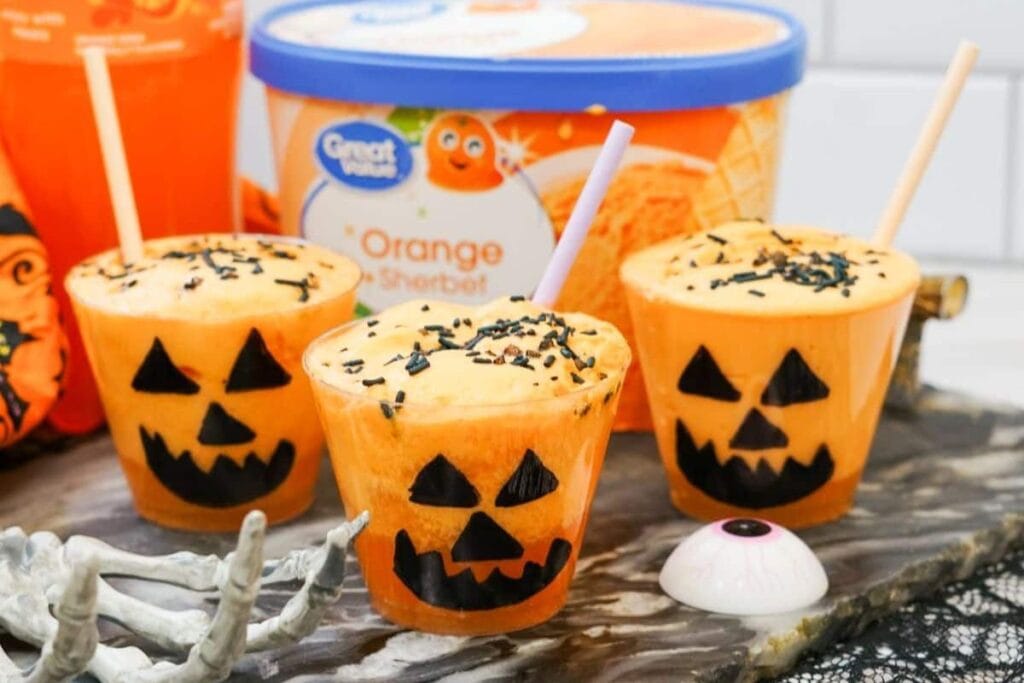 A close up shot of Fanta jack o lantern floats.