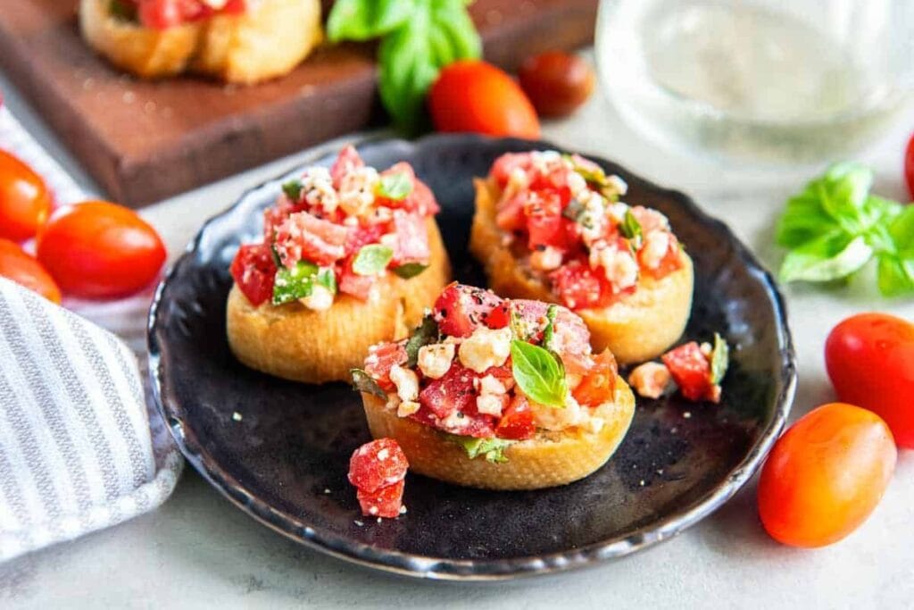 A close up shot of feta bruschetta.
