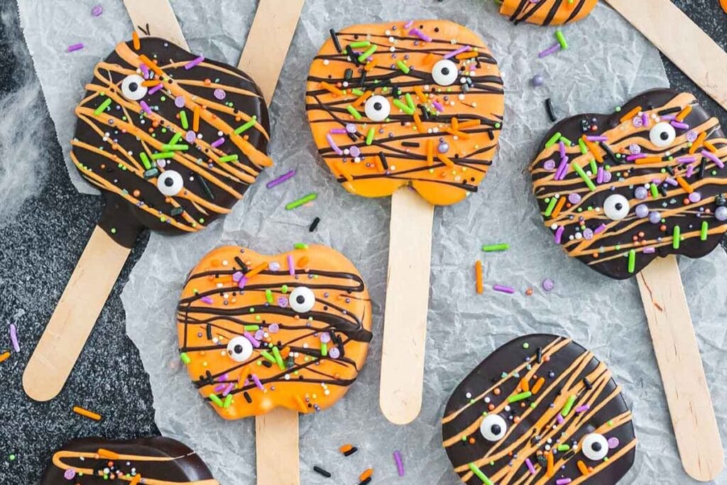 A close up shot of apple pops for Halloween.