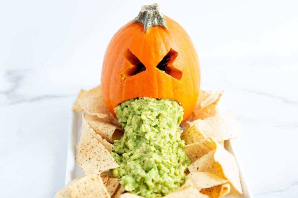 A close up shot of puking pumpkin.