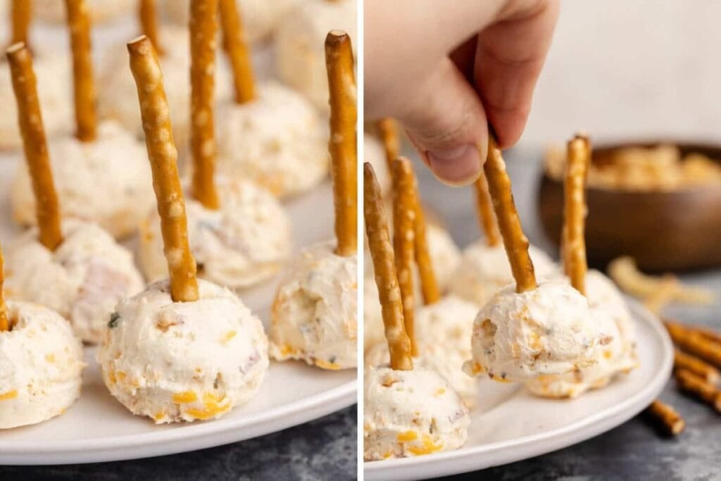 Cheese ball bites with pretzel stick handles on a white plate.