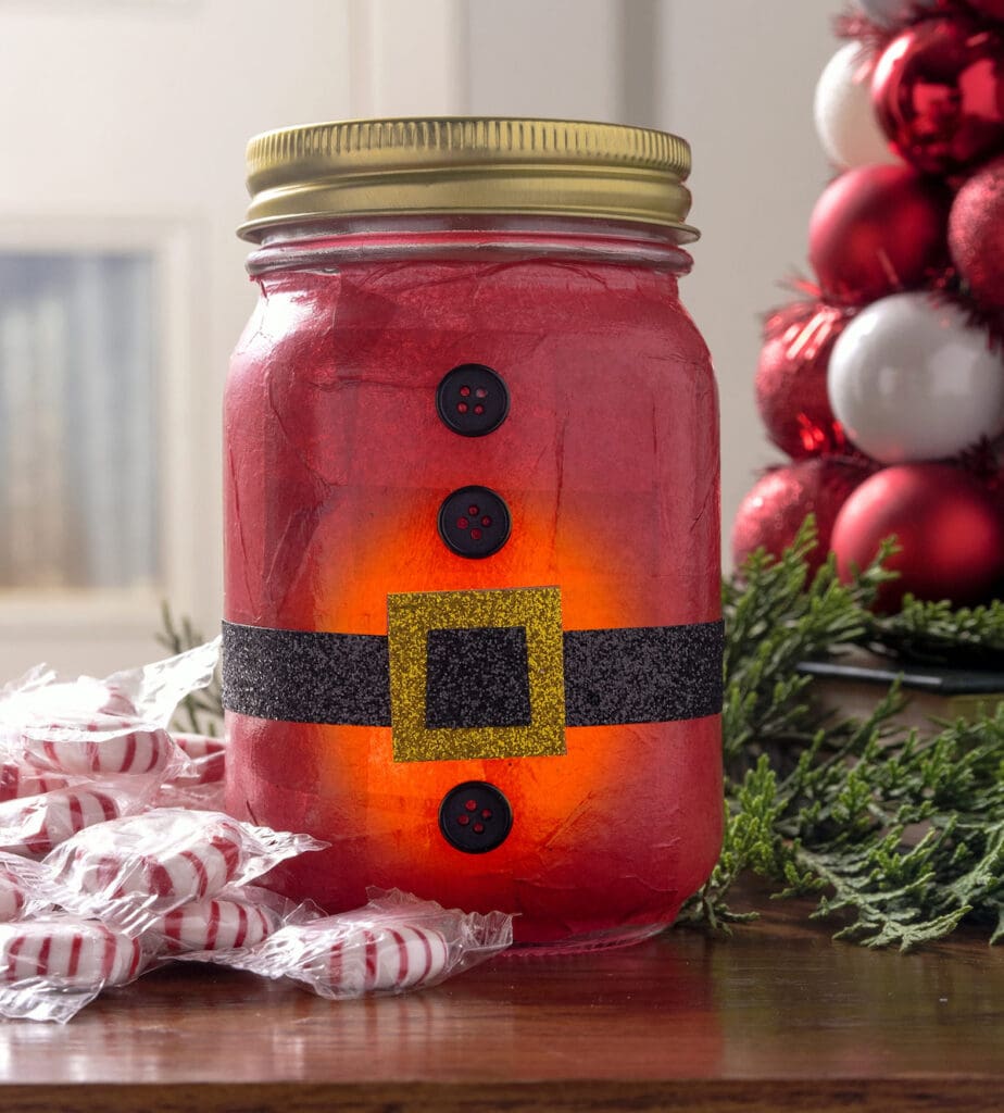 A close up shot of Santa mason jar.