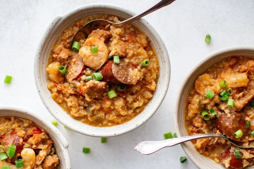 Overhead shot of jambalaya with shrimp, sausage, and green onions.