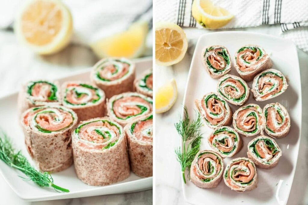 Smoked salmon pinwheel appetizers on plates with lemon wedges.