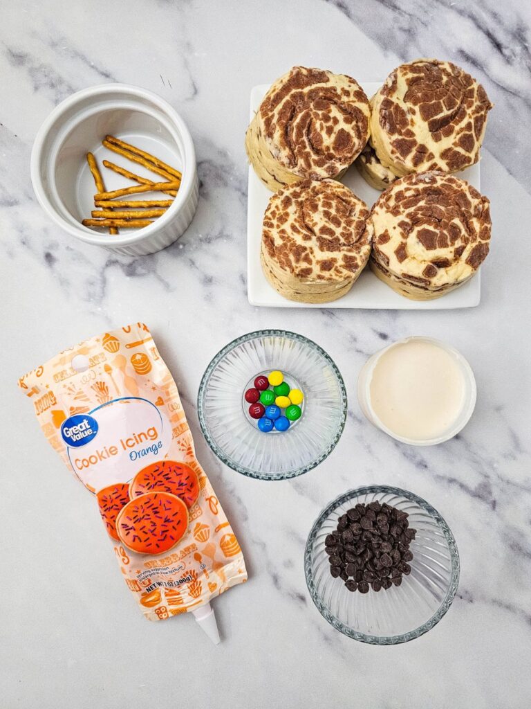 Ingredients for snowman cinnamon rolls.